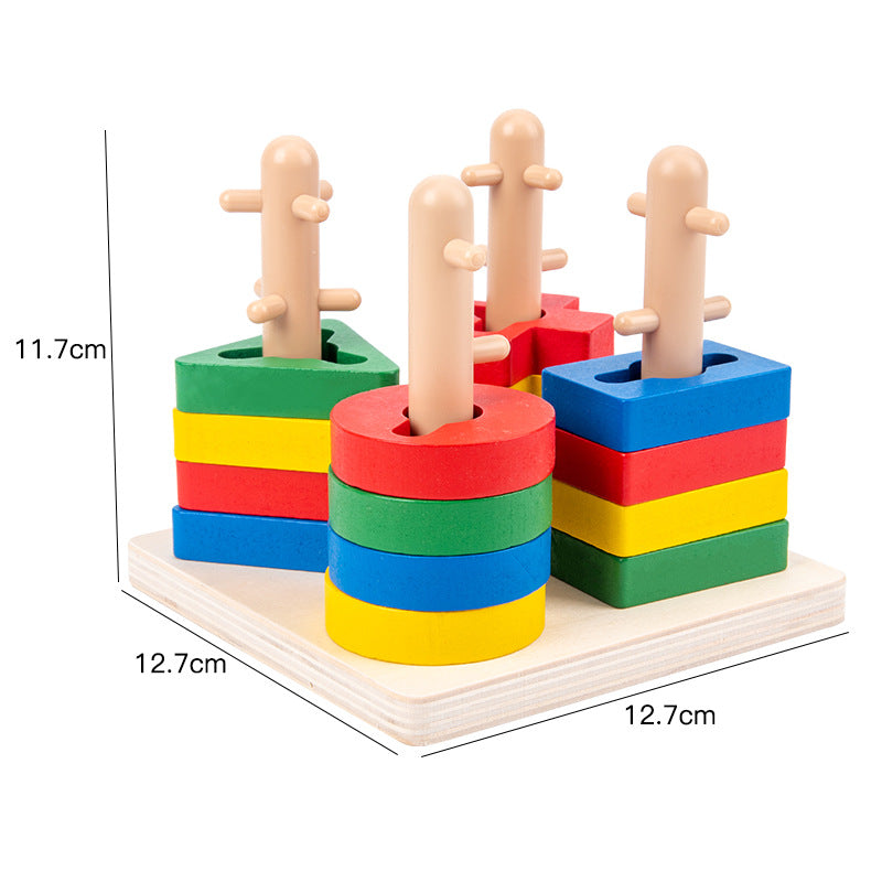Colourful organ sleeve column set on a birch base, 12.7 by 12.7 cm and 11.7 cm tall, with tall pegged posts and stacked primary-coloured pieces