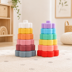 Soft silicone flower stacking tower for babies in pastel colors on a light play mat
