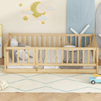 Twin size oak Montessori floor bed made up with white bedding in a nursery with a moon and cloud wall display