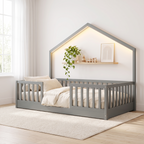 Twin size grey Montessori floor bed with LED lights, made up with cream bedding in a bright Scandinavian nursery